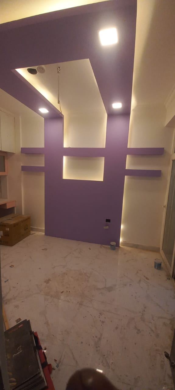 Ceiling & Accent Wall Combination: False Ceilings by Supreme Kitchens, Noida