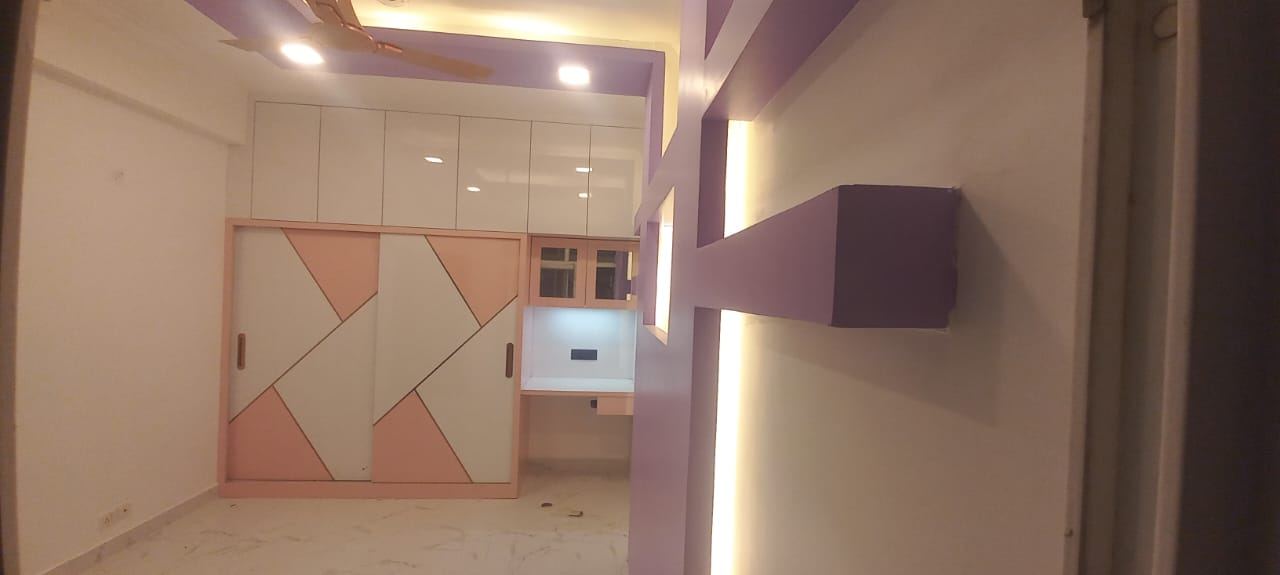 Kids' Wardrobe with Study Table: Wardrobes by Supreme Kitchens, Noida