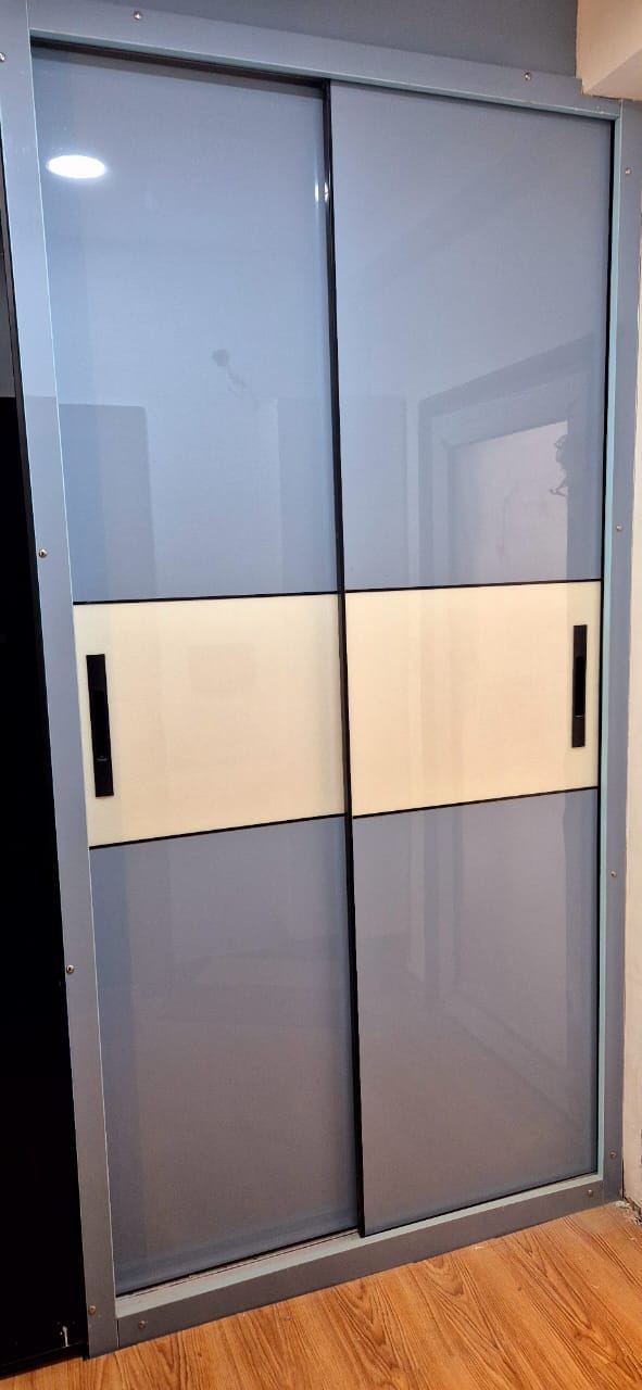 Two-Tone Sliding Wardrobe: Wardrobes by Supreme Kitchens, Noida