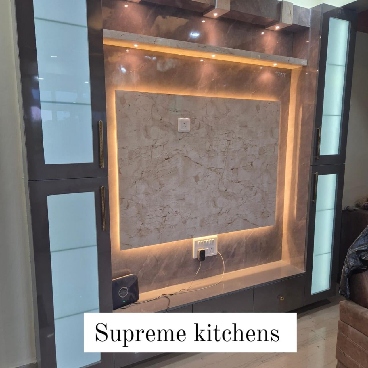 Backlit Stone TV Panel: Living & TV Units by Supreme Kitchens, Noida